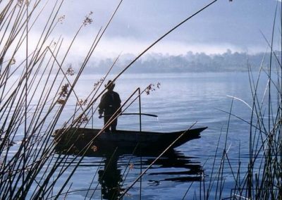 Fisherman by Chuitinimit Santiago Atitlán in background