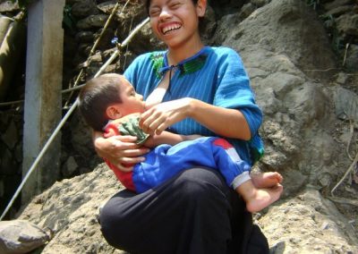 Cruz with child, Tzununá