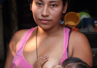 Initially, i felt that photographs of mothers breast'feeding were an invasion of one{s privacy. However, I later learned that Maya mothers, like Carmen, loved to have these memories .