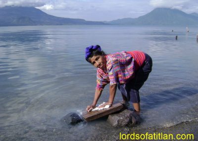 Woman from Santa Catarina Palopó washing in Lake Atitlán but in in Panajachel