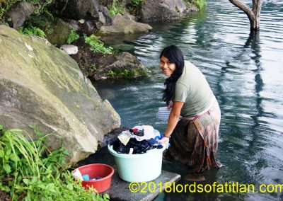 Nancy washing in Las Conchitas, San Lucas Tolimán, however only two weeks before giving birth.