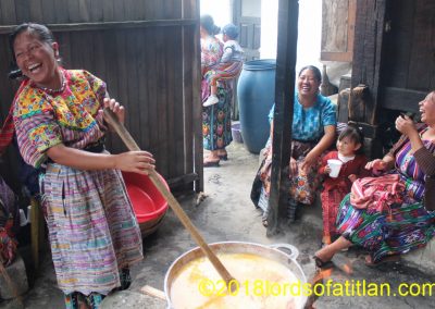 Laughter in the kitchen at the festival of Aloc Mam in Zunil. But could they be laughing at me?