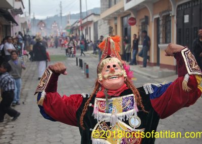 But isn't he an arrogant conquistador? Here is the pompous ass in Patzicia in the fair of St. James (Santiago), with Pedro in white pants lighting explosives in the background. ,