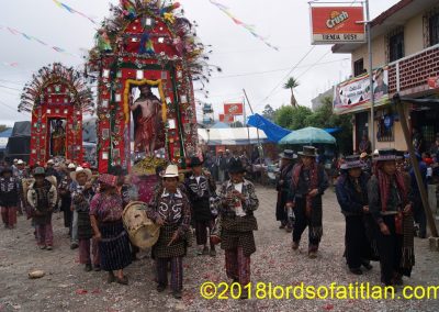 Guicho (chirimiya) and Catarino (tambor) lead the procession in the f air of San Bartolo, Aug. 24th, Barrio San Bartolo, Sololá.