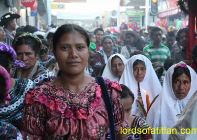 The beautiful woman in foreground is from a small community within Joyaba., However, she wears a blouse from Santa Cruz del Quiché.