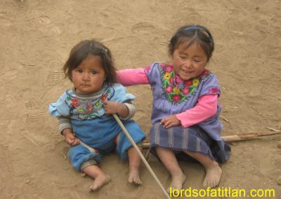 These girls are from Chui Cumez I, Concepción, but their mother comes from Santiago Atitlán. Therefore, they wear huipiles of Atitlán.