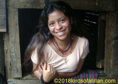 Her home is rustic and poor, but look at how Dorcas of Aldea Xejuyú, San Lucas Tolimán smiles.