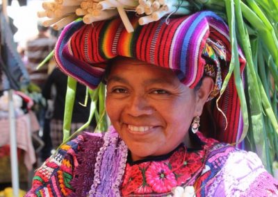 This woman from Almolonga has her own sales stall but mostly walks through the market offering her products.